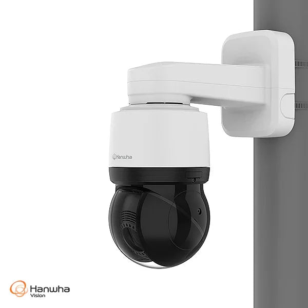 Security camera with Hanwha Vision branding on a white background